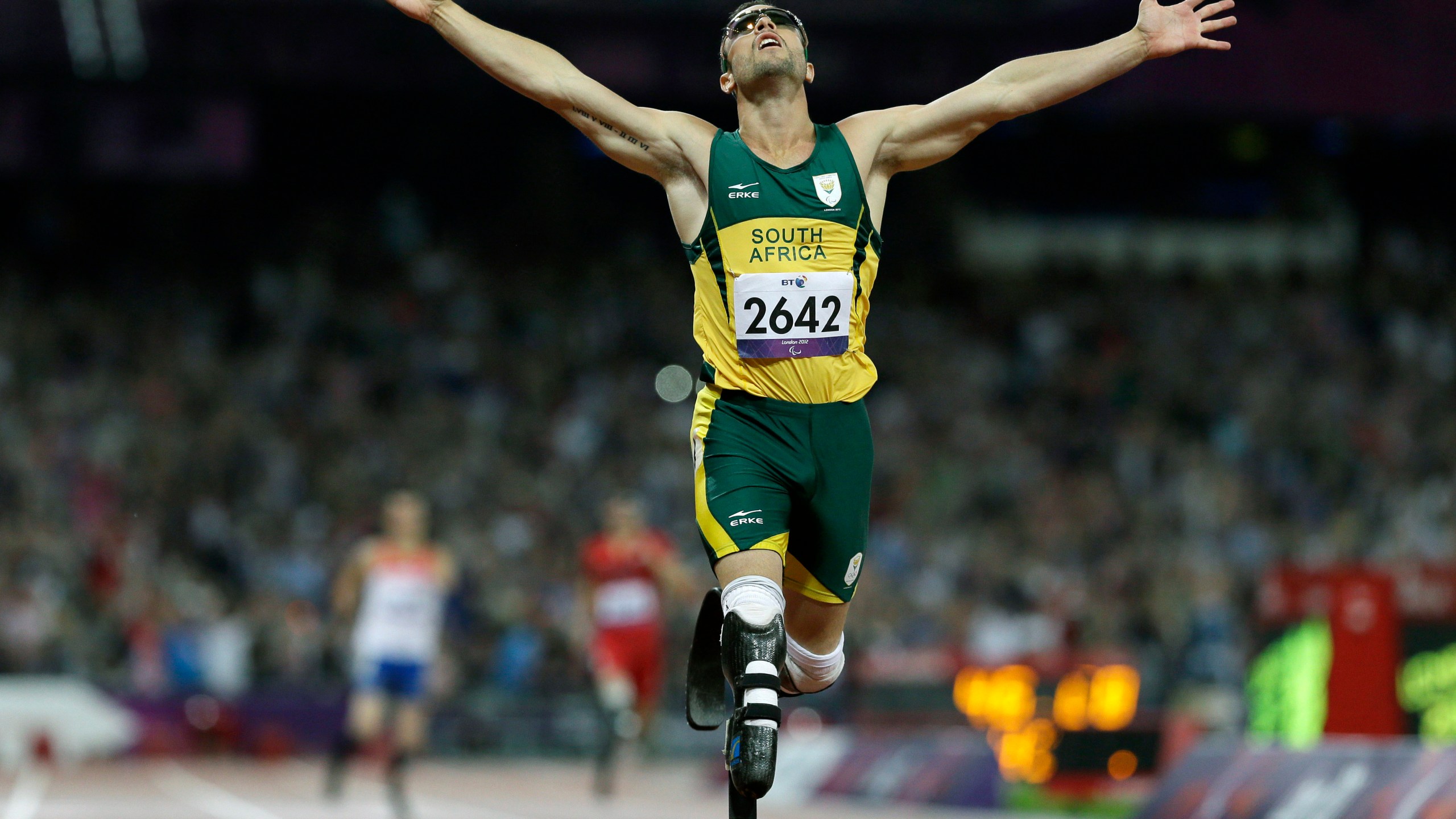 FILE - South Africa's Oscar Pistorius wins gold in the men's 400-meter T44 final at the 2012 Paralympics in London on Sept. 8, 2012. Oscar Pistorius is due on Friday, Jan. 5, 2024 to be released from prison on parole to live under strict conditions at a family home after serving nearly nine years of his murder sentence for the shooting death of girlfriend Reeva Steenkamp on Valentine’s Day 2013. (AP Photo/Kirsty Wigglesworth, File)