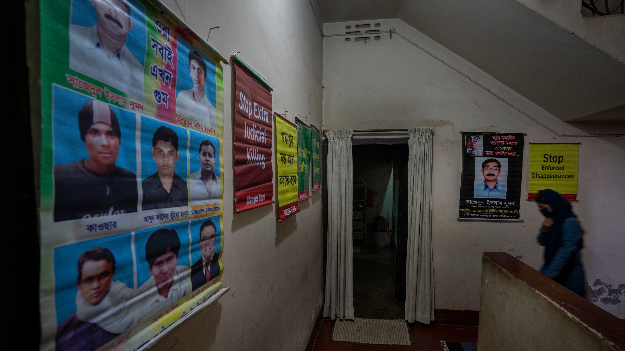 Anisha Islam Insha, 17, daughter of Ismail Hossain Baten, who disappeared in 2019, walks in the office of Mayer Daak, Mother's Call, a platform for family members of victims of enforced disappearances in Bangladesh, in Dhaka, Bangladesh, Thursday, Jan. 4, 2024. The main opposition Bangladesh Nationalist Party, led by former premier Khaleda Zia, have accused Prime Minister Sheikh Hasina's government of a major crackdown targeting its supporters and opposition politicians on what they say are trumped-up charges in the lead-up to the polls. (AP Photo/Altaf Qadri)