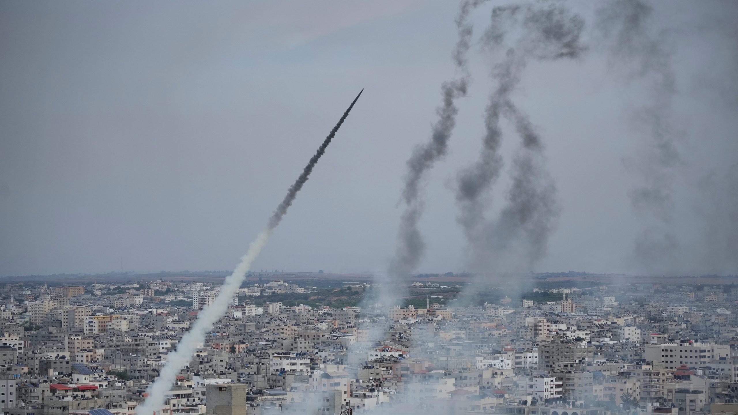 FILE - Rockets are launched by Palestinian militants from the Gaza Strip towards Israel, in Gaza, Saturday, Oct. 7, 2023. (AP Photo/Hatem Moussa, File)